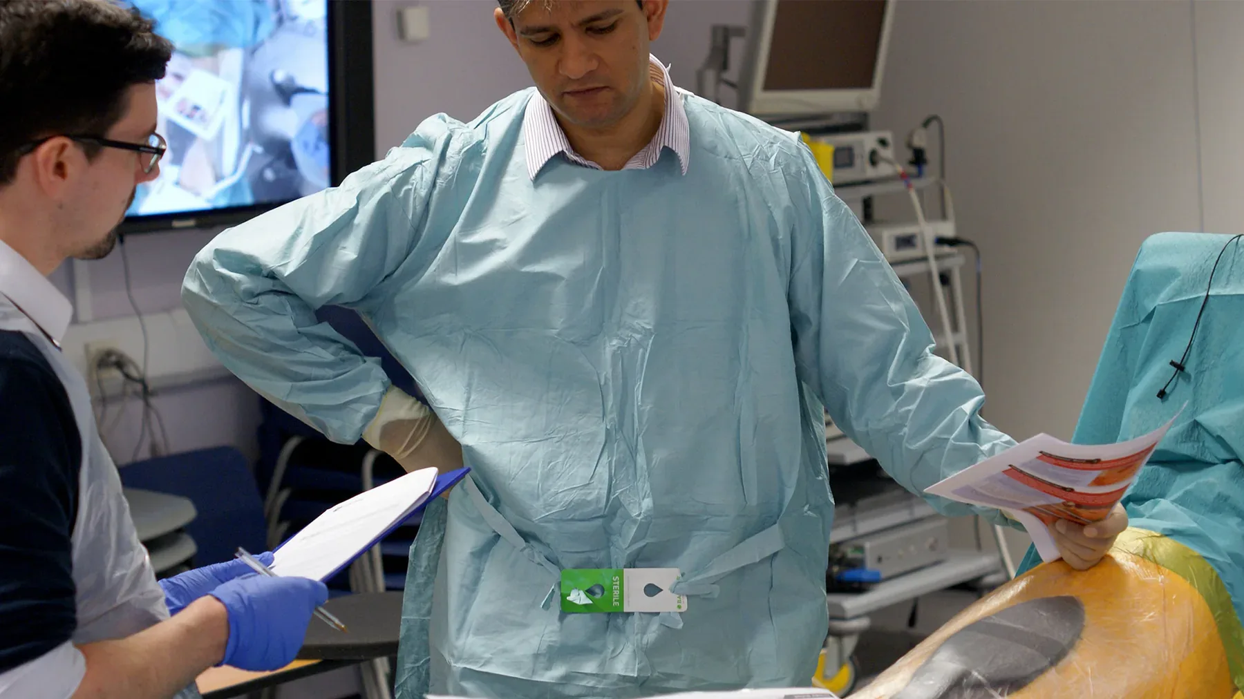 Surgeon with researcher during study session